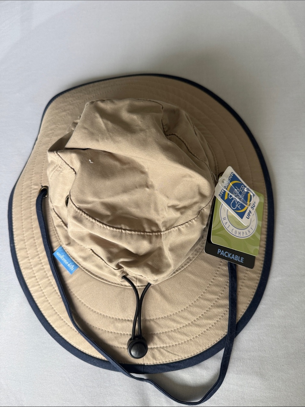 Packable Khaki Bucket Hat with Navy Trim and Chin Cord